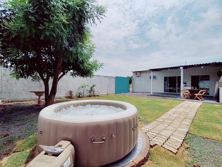Casa agradável com jacuzzi, área de lazer, enxoval